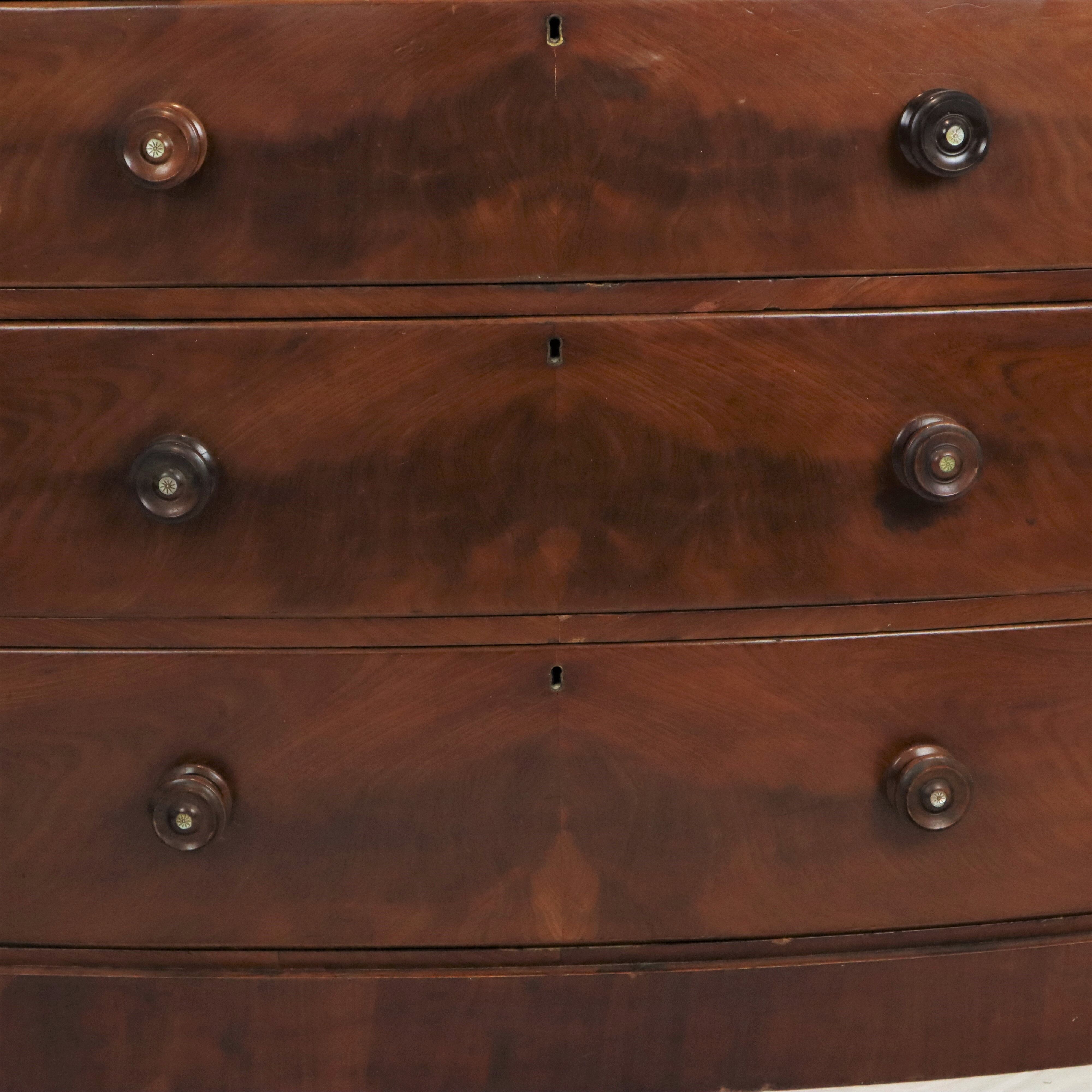 Antique english chest of drawers bow front mirrored mahogany veneer 120cm