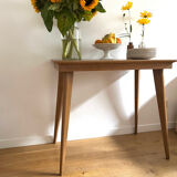 Side table with compass legs