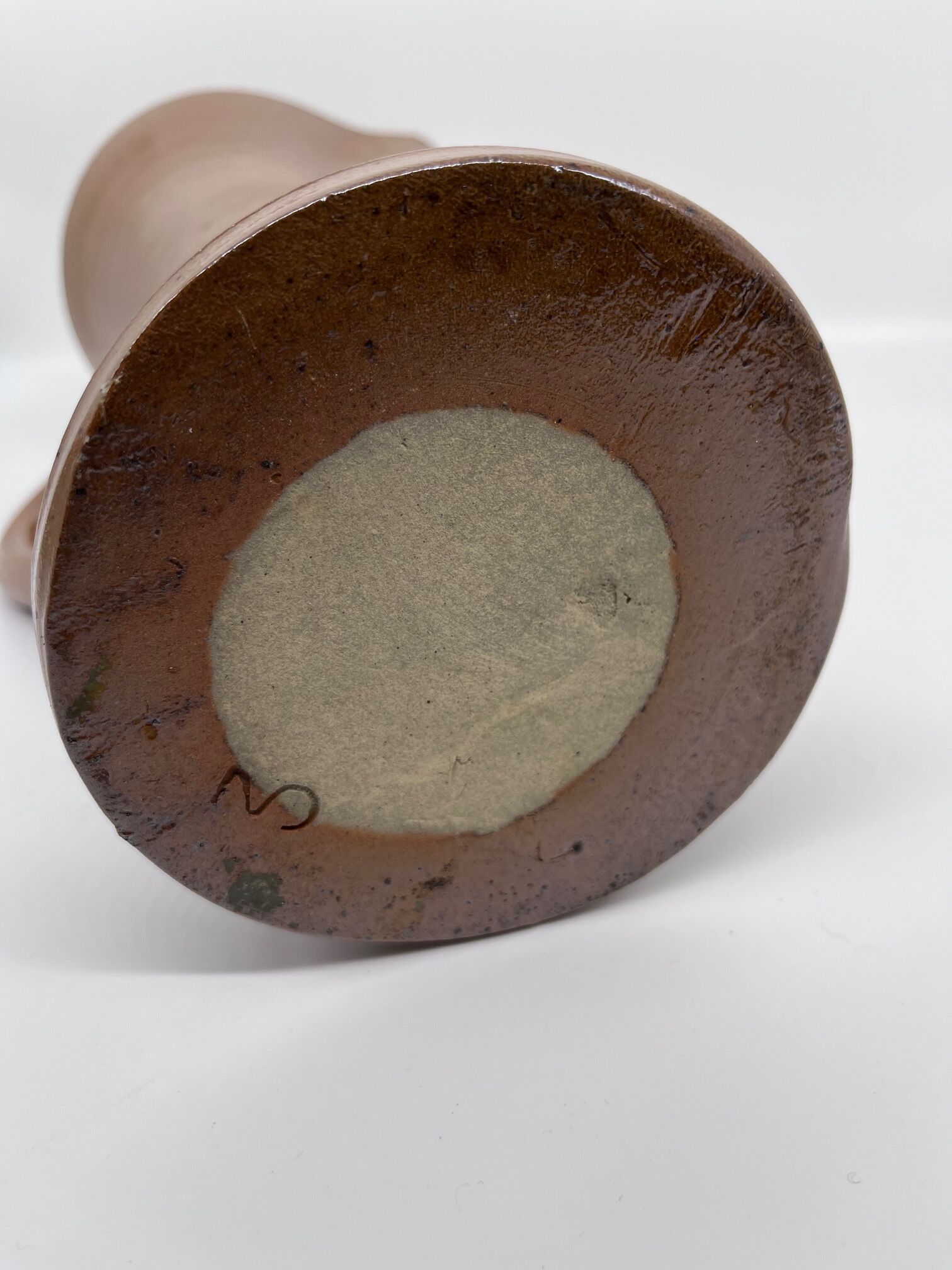 Pitcher in sandstone