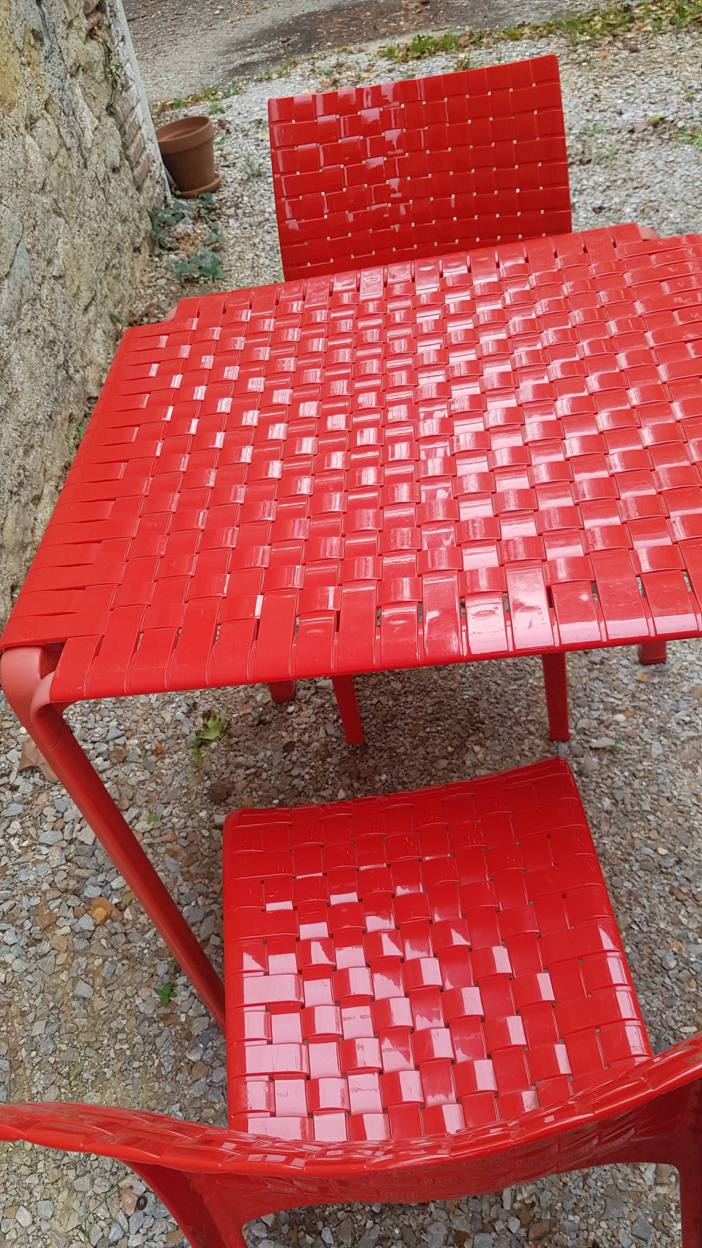 Kartell table and 2 chairs