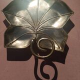 Gilded brass leaf pocket emptier