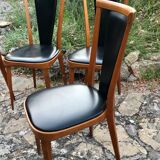Four vintage beech and skai chairs