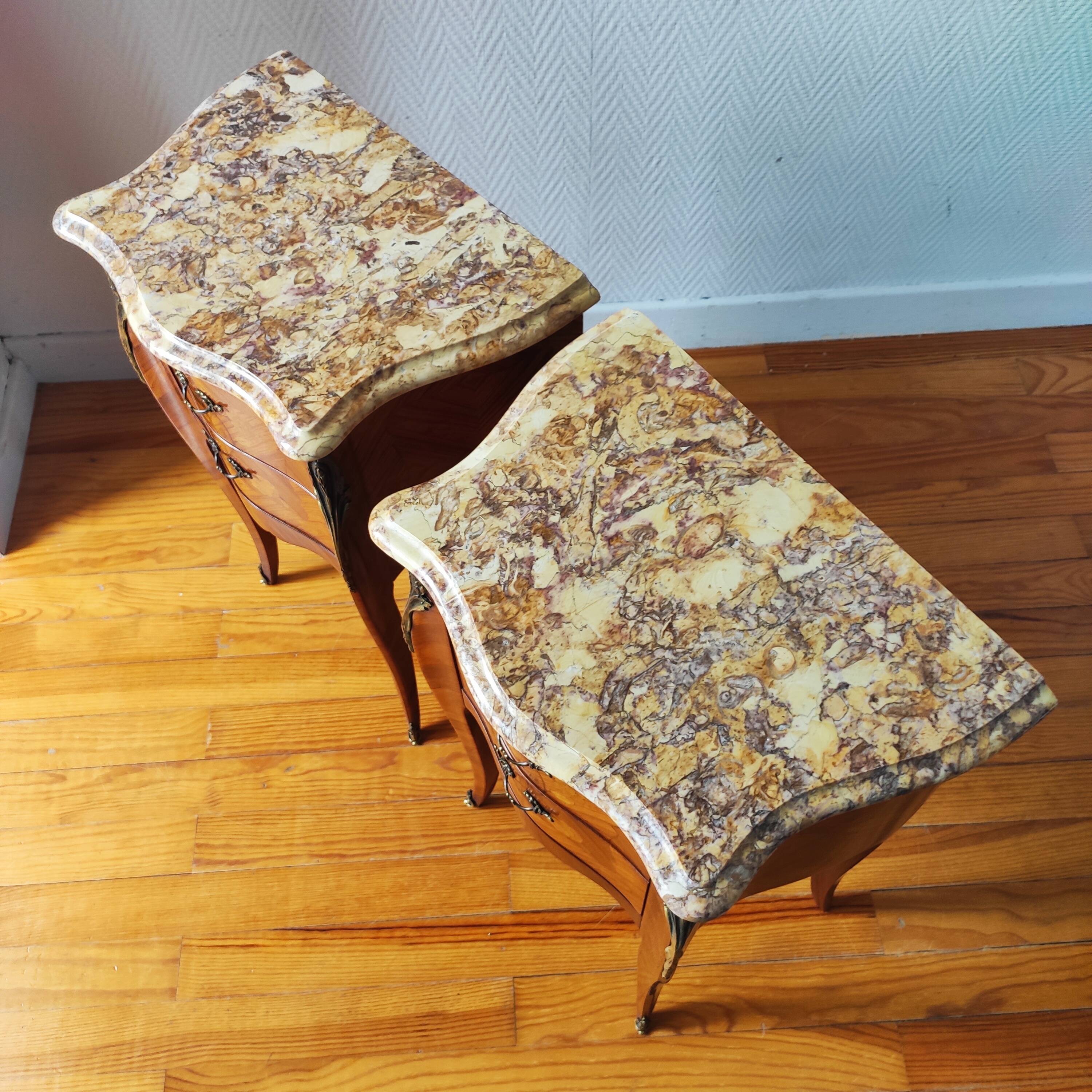 Pair of French Louis XV style bedside tables.