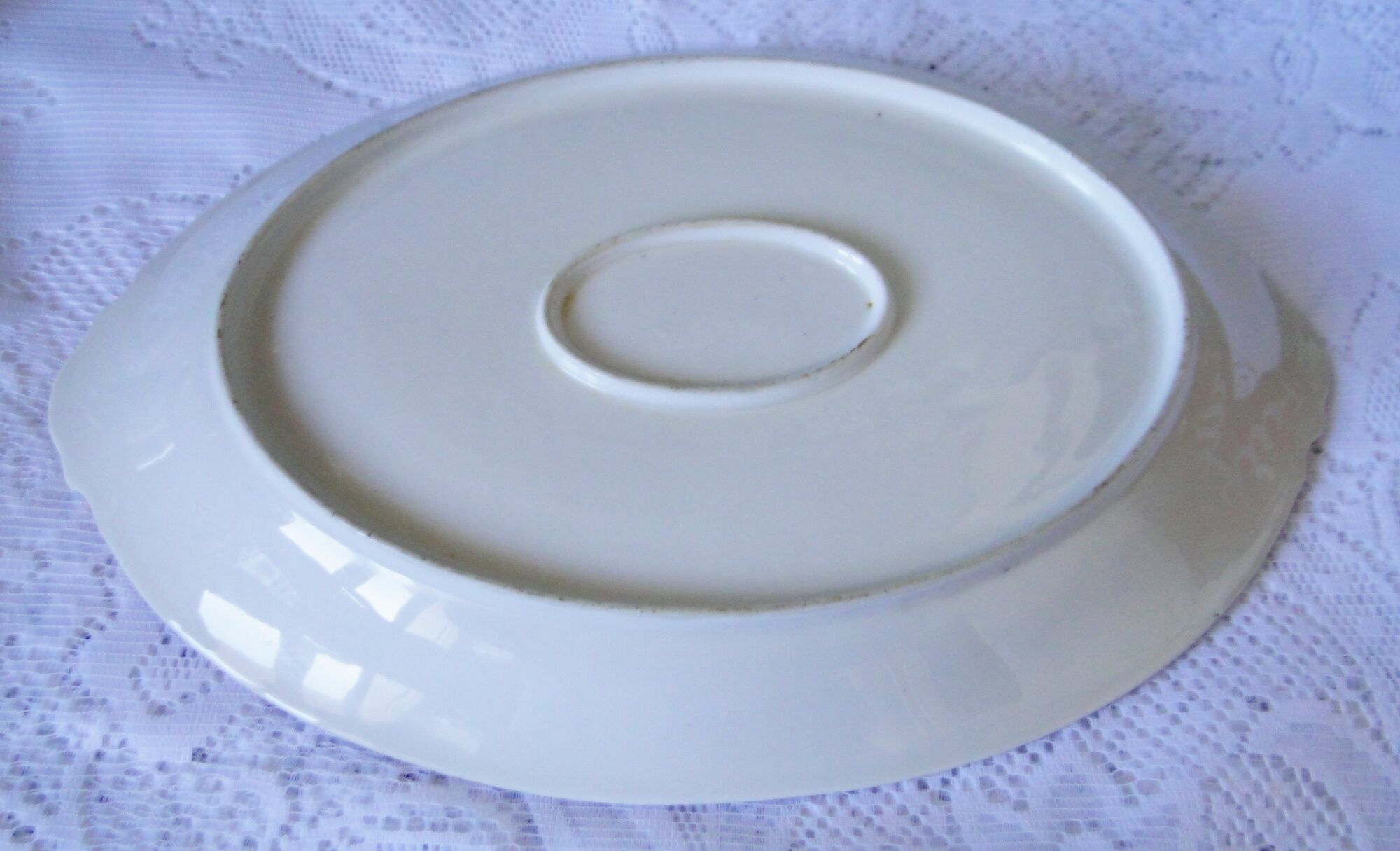 Large old oval dish in art deco porcelain