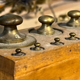 Complete series of brass weights for scales