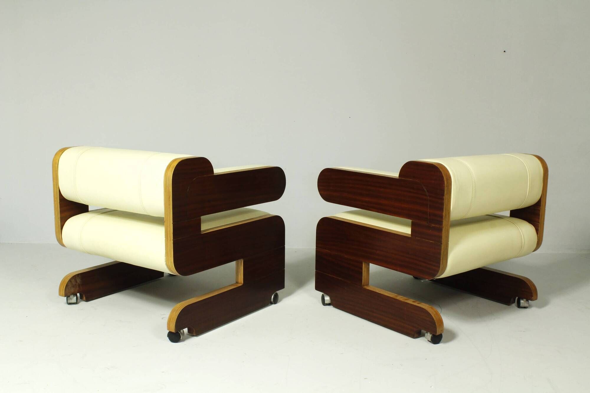 Pair of Mahogany Club Chairs upholstered in leather, 1970s