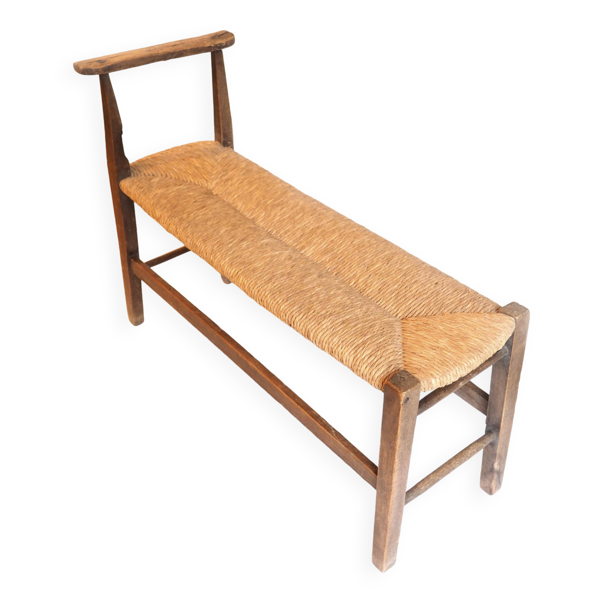 Straw and old wood bench