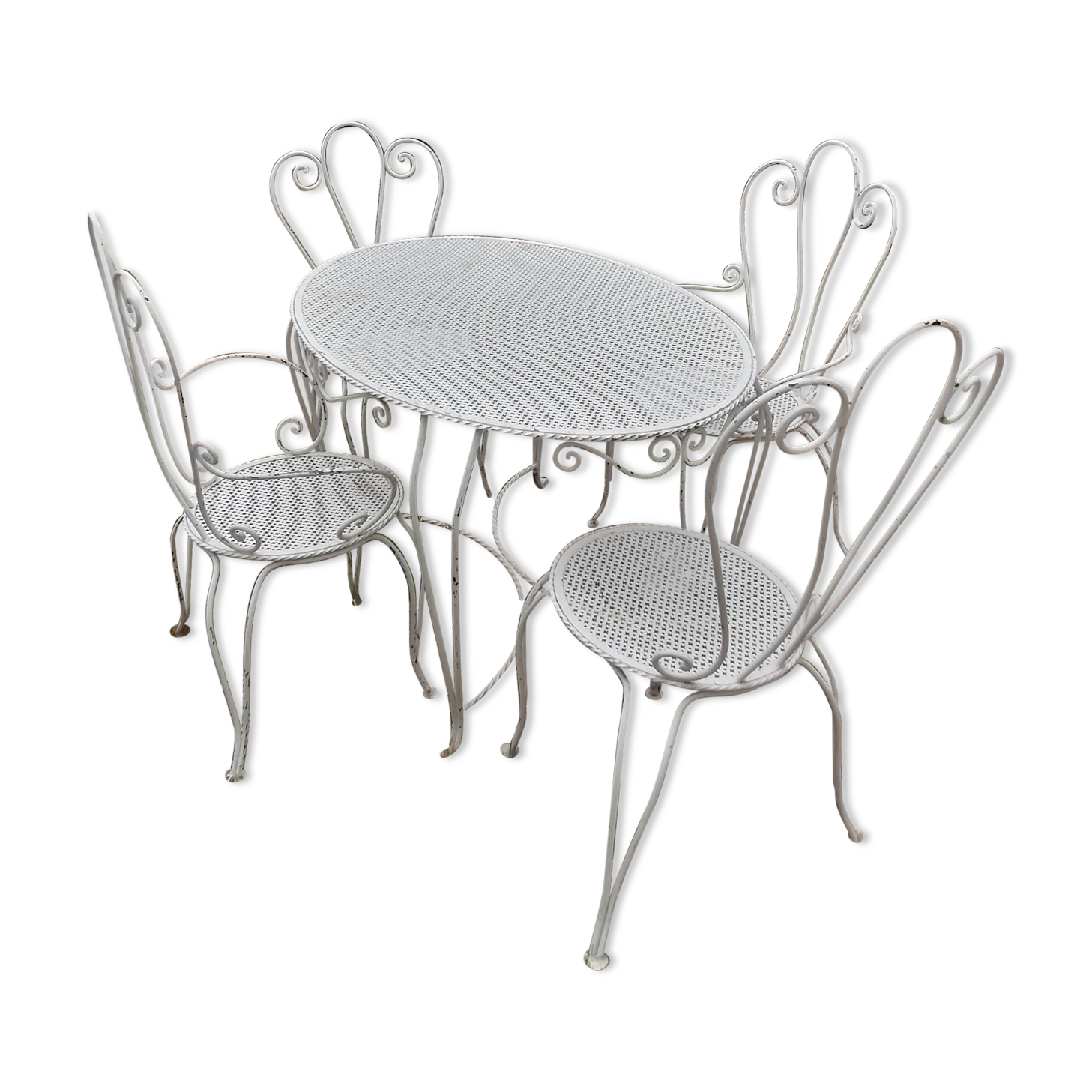 Garden furniture in wrought iron of the 70s. 5 pieces, oval table.