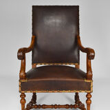 Louis XIII office armchair in leather and walnut carved around 1860