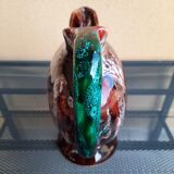 Earthenware pitcher signed vallauris, brown, orange, green, flammé décor, tbe.