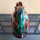 Earthenware pitcher signed vallauris, brown, orange, green, flammé décor, tbe.