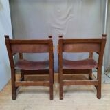 Paire de fauteuils style médiéval en cuir