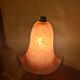 Antique wrought iron floor lamp, 1900, with a glass shade, 40x15.