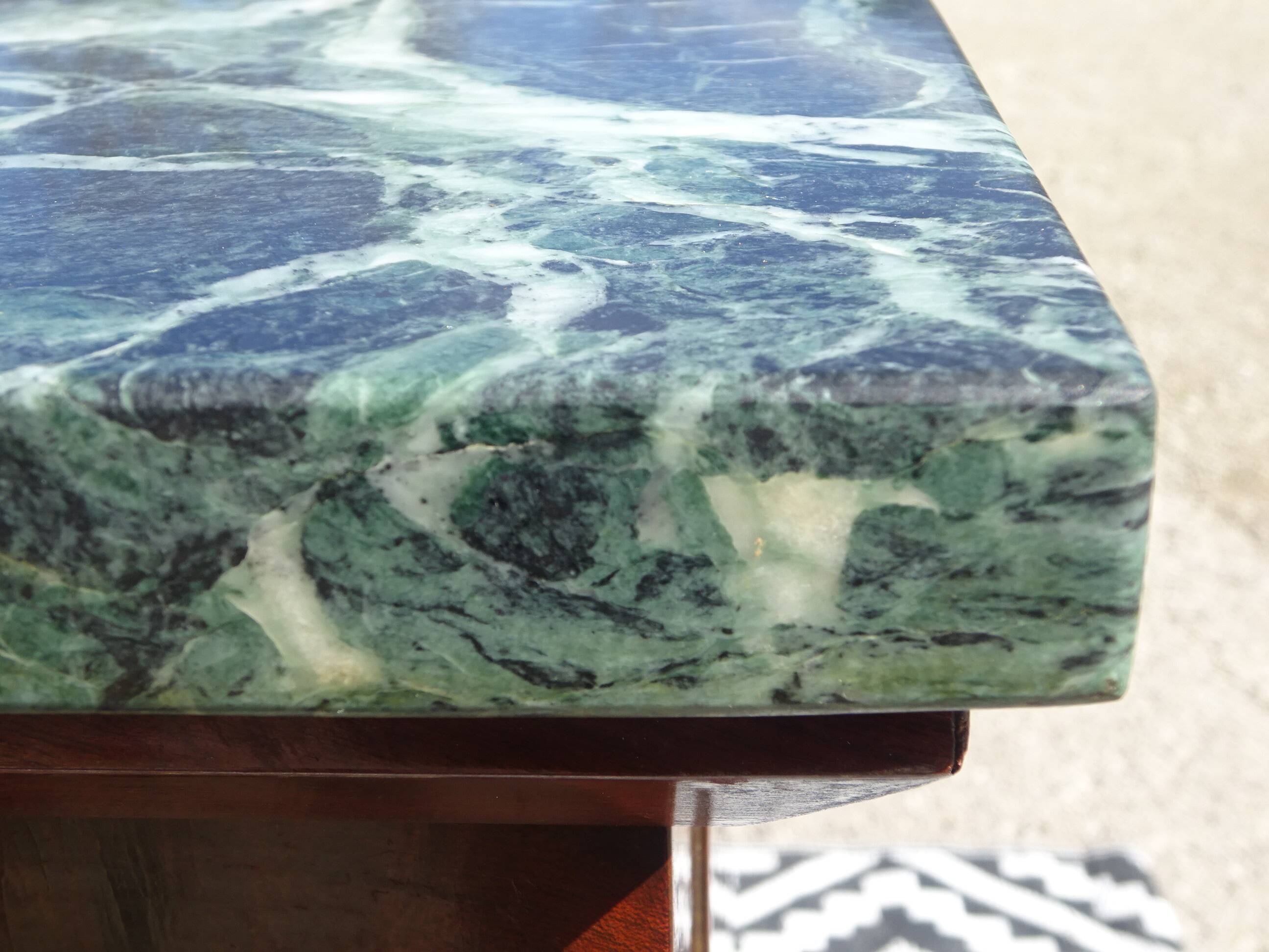 Flamed mahogany enfilade with sea green marble in Empire style.