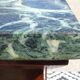 Flamed mahogany enfilade with sea green marble in Empire style.