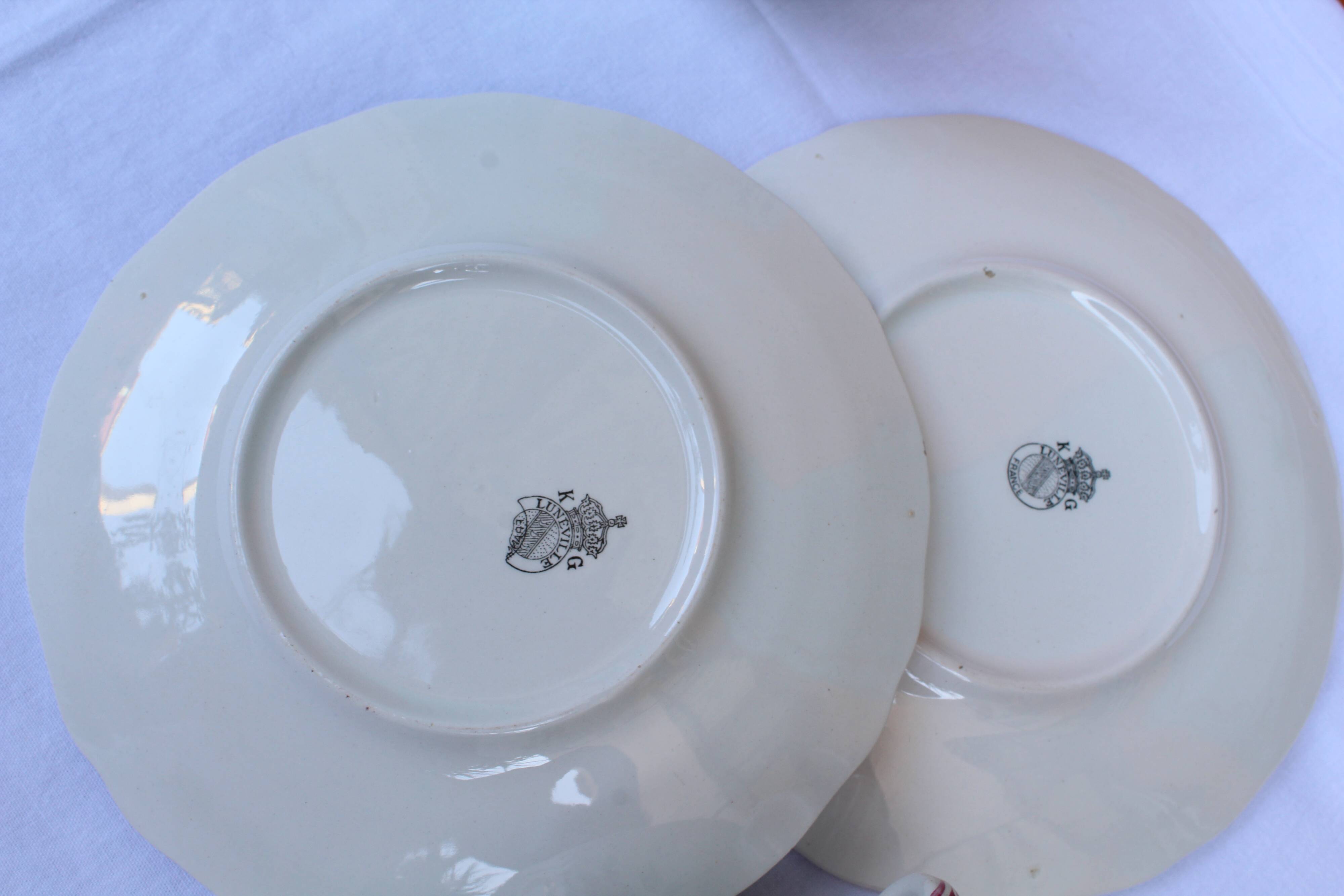 Lunéville earthenware cups and saucers