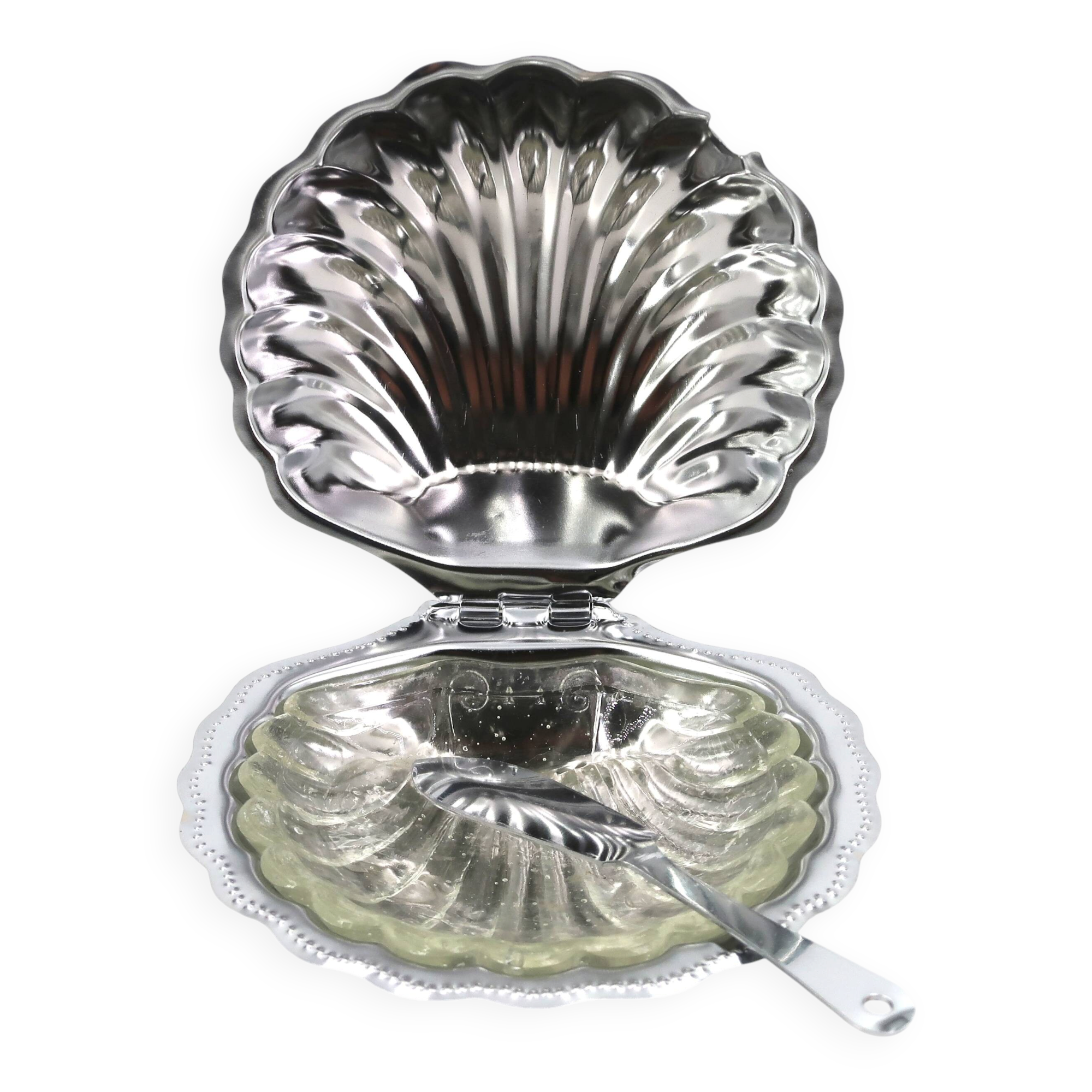Silver-plated metal and glass shell-shaped butter dish with its knife.
