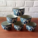 Asian ceramic and rattan tea set with plant geisha motifs