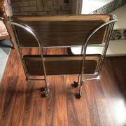 Vintage foldable modular table in formica with chrome legs.