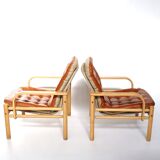 Upholstered leather armchairs 70s