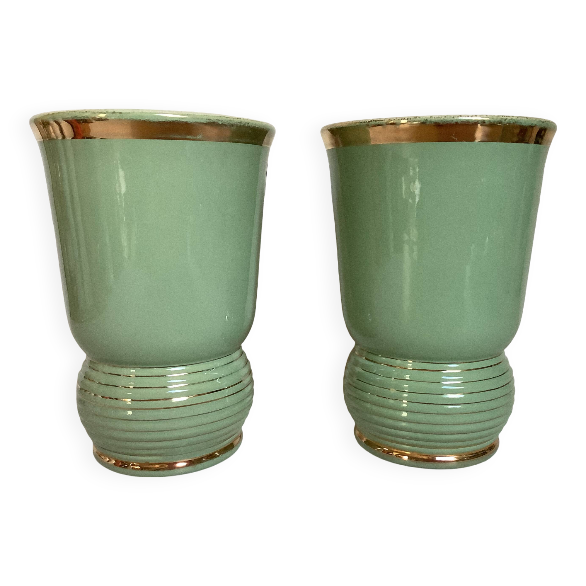 Pair of antique green and gold ceramic vases