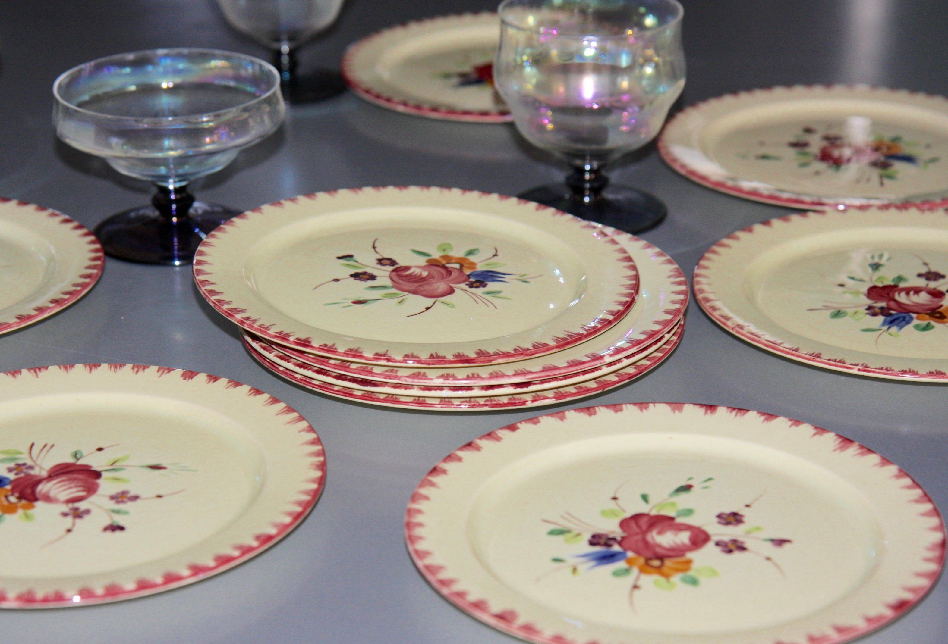 Eleven vintage plates in fine earthenware from Longchamp, Padua model.