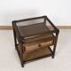 Rattan and cane bedside table, smoked glass top