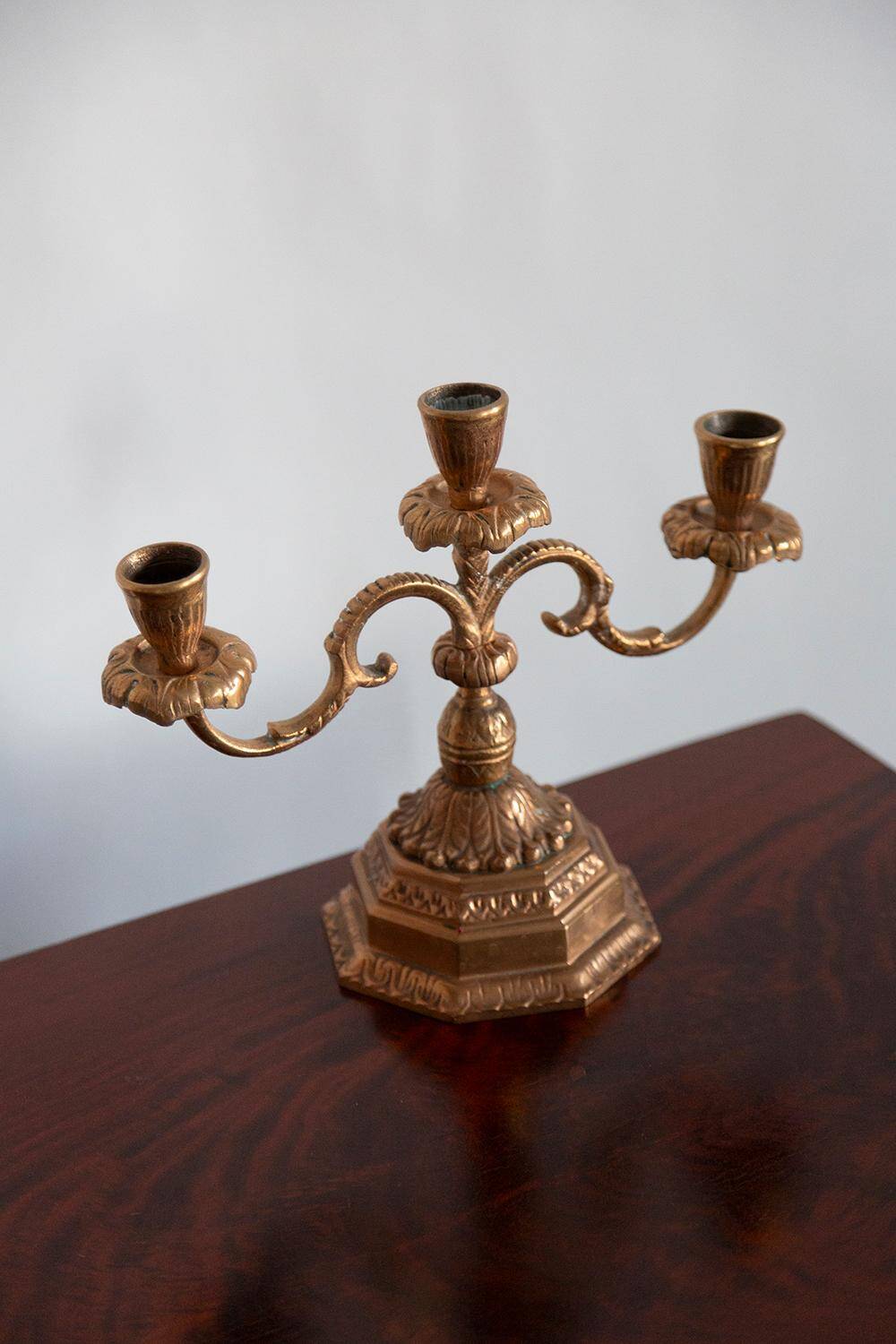 Decorative golden metal candle holders from the mid-20th century, Menora, France, 1960s.