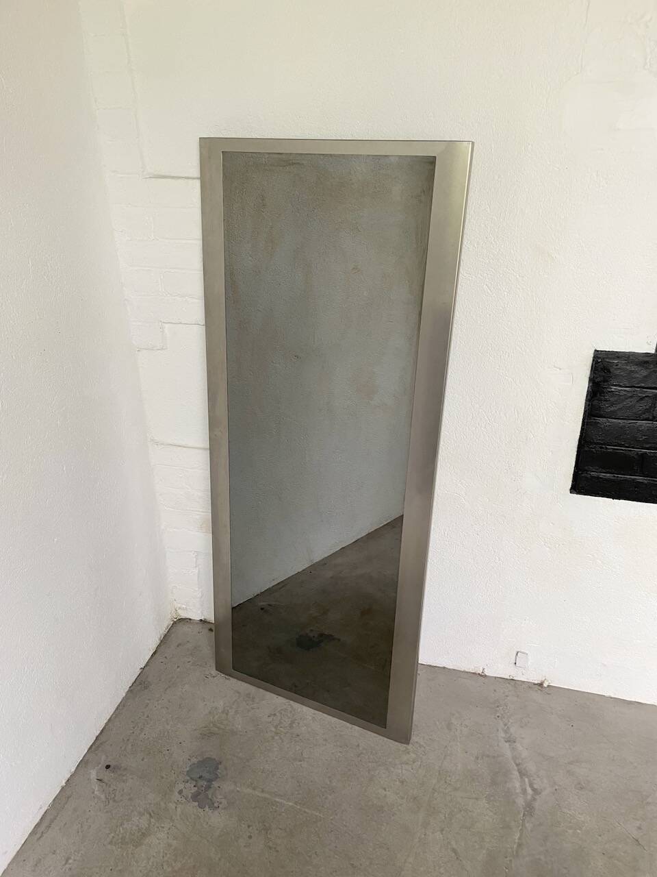Brushed stainless steel mirror circa François Monnet and Joelle Ferlande