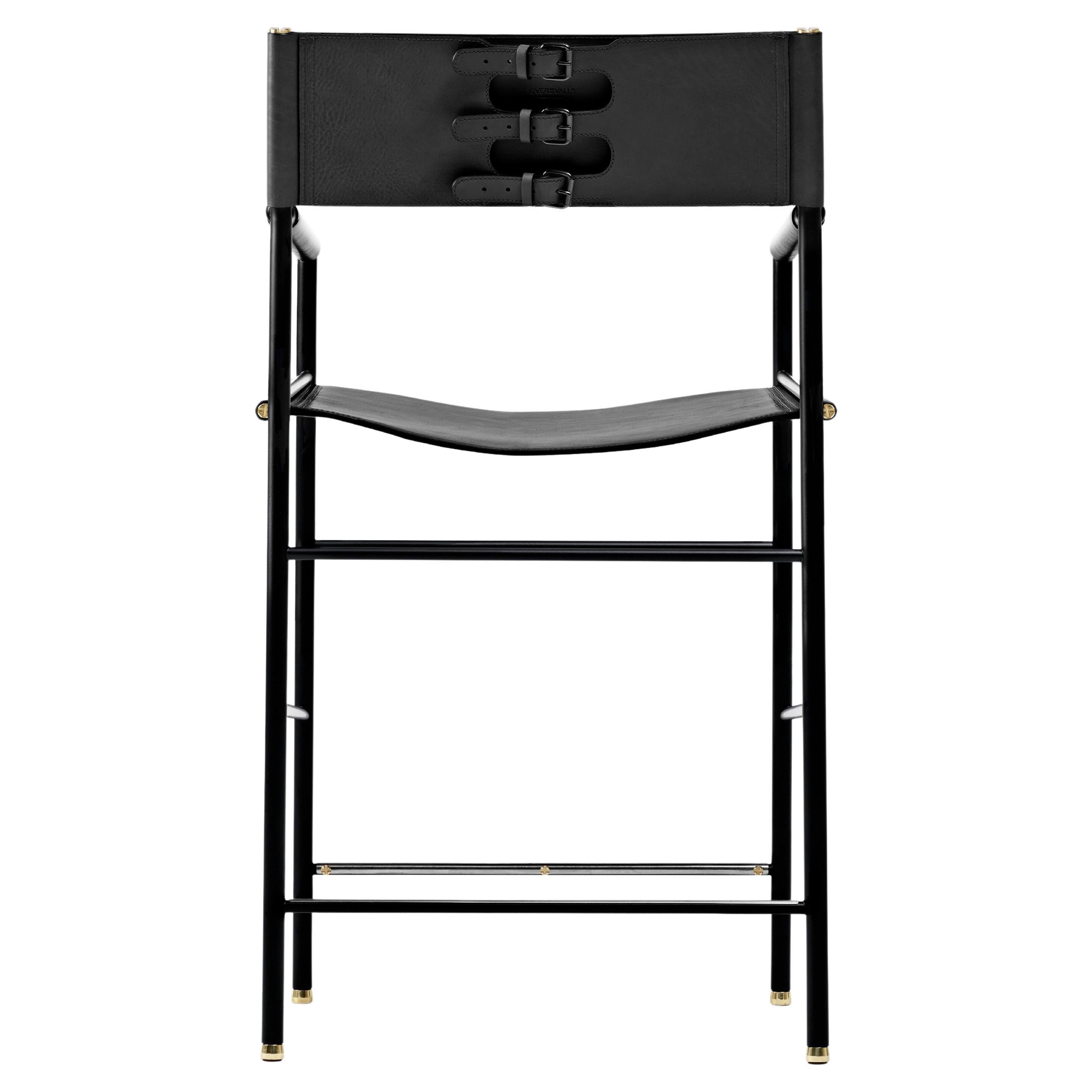 Contemporary classic bar stool with black leather backrest, black rubber metal structure.