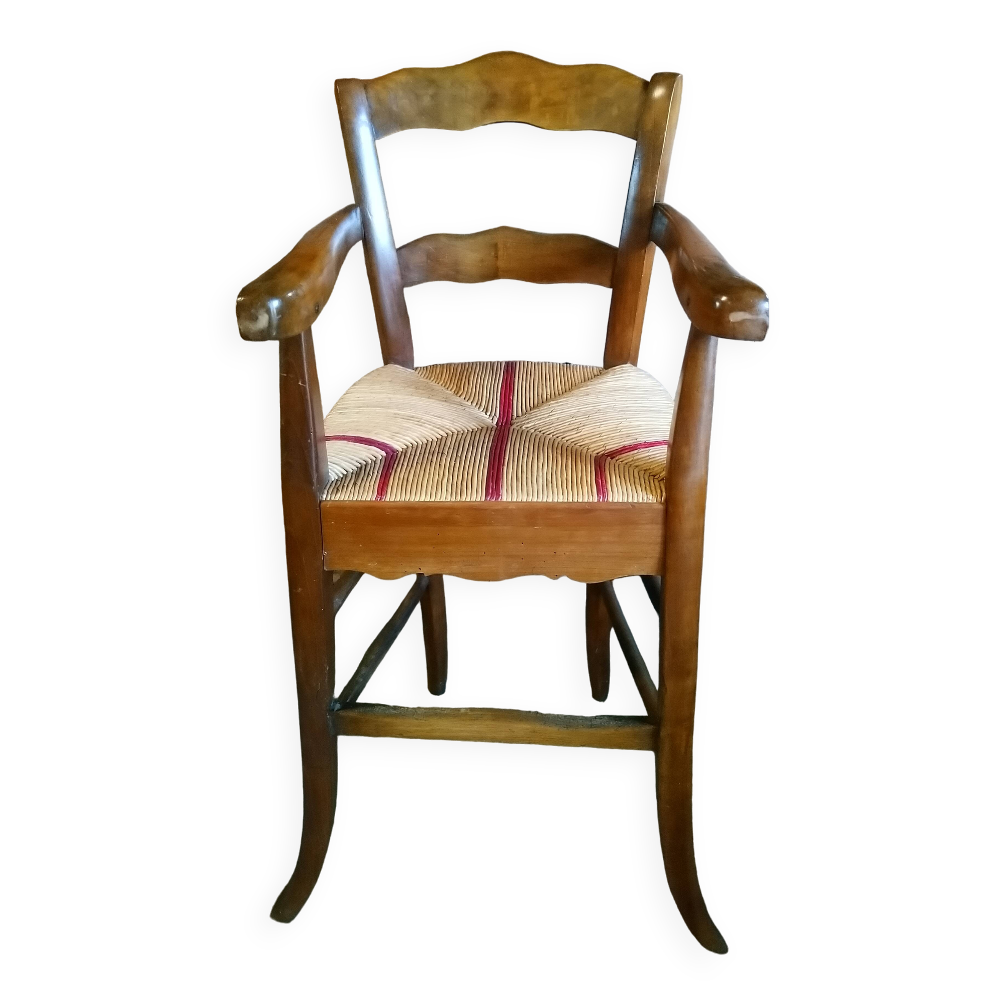Child's high chair with a rush seat in walnut