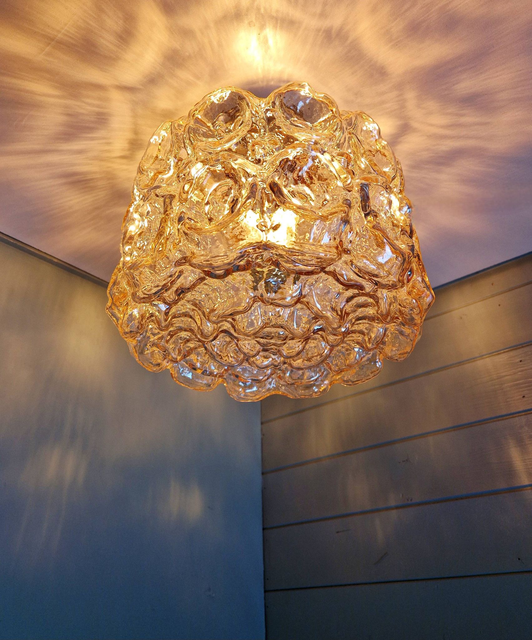 Brass and amber textured glass ceiling light, design by Helena Tynell, Limburg.