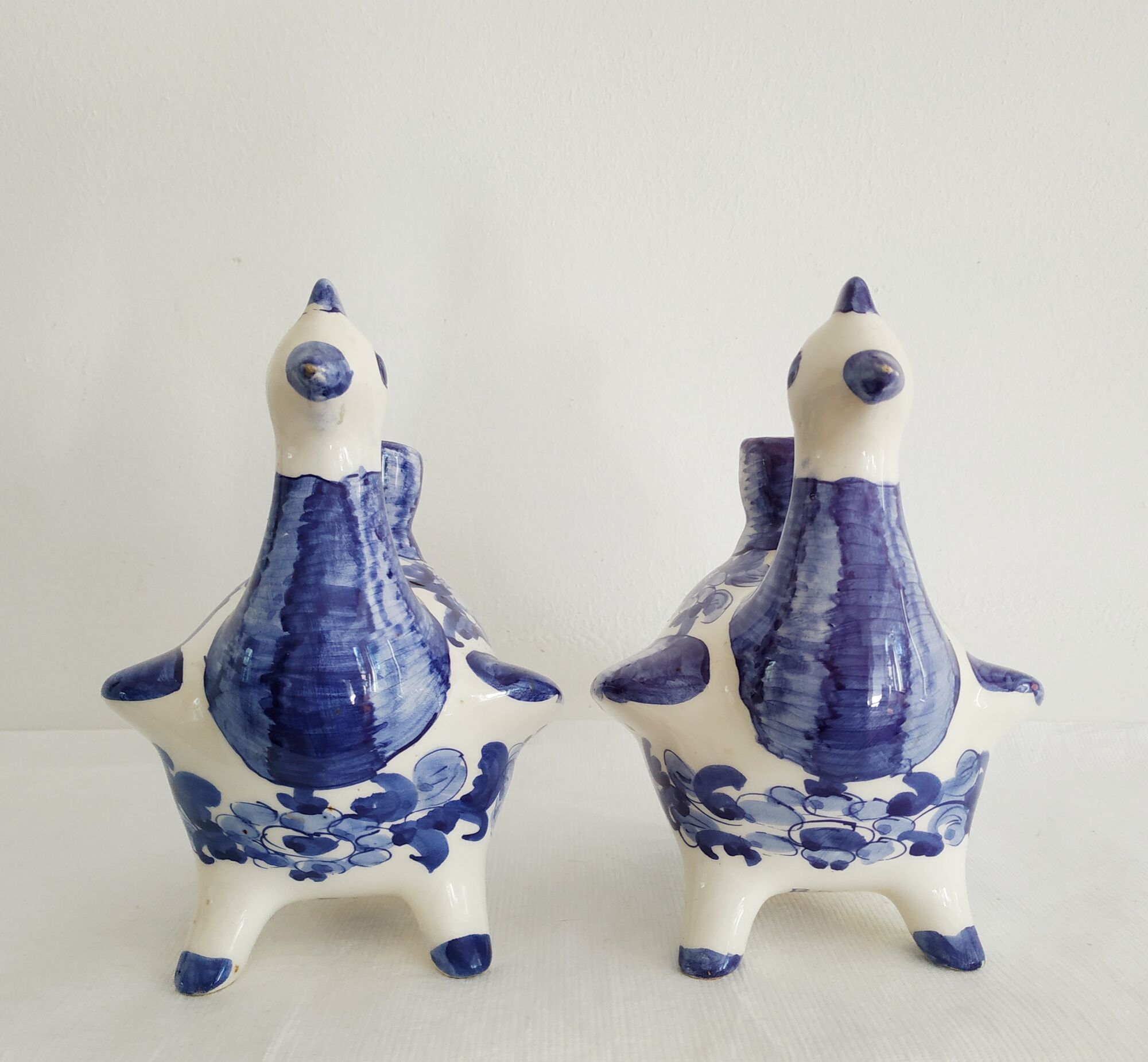 Pair of bird candlesticks in blue white, Skyros earthenware