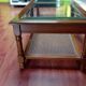 Coffee table in wood, glass and rattan