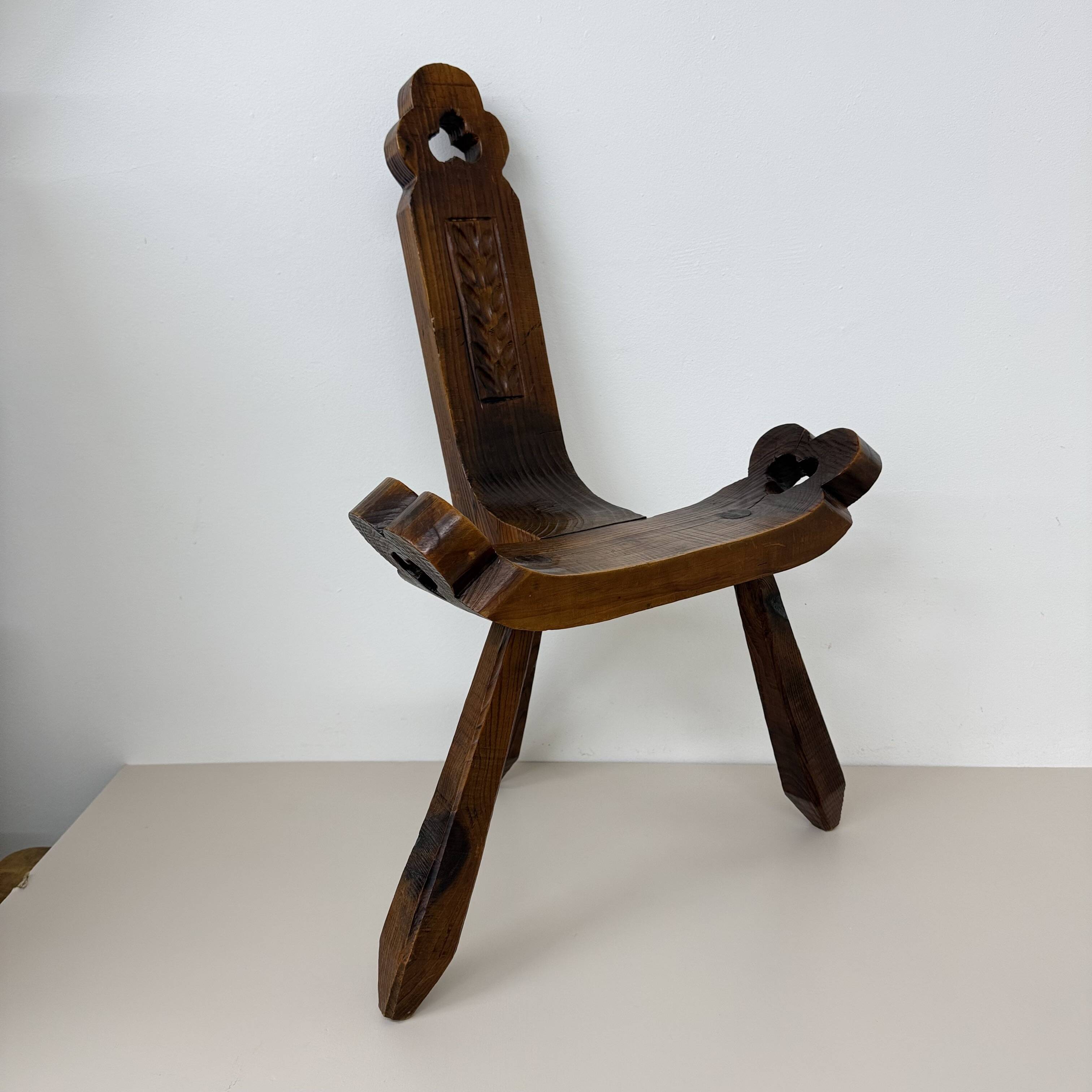 Brutalist hand carved oak Spanish tripod chair , 1970s