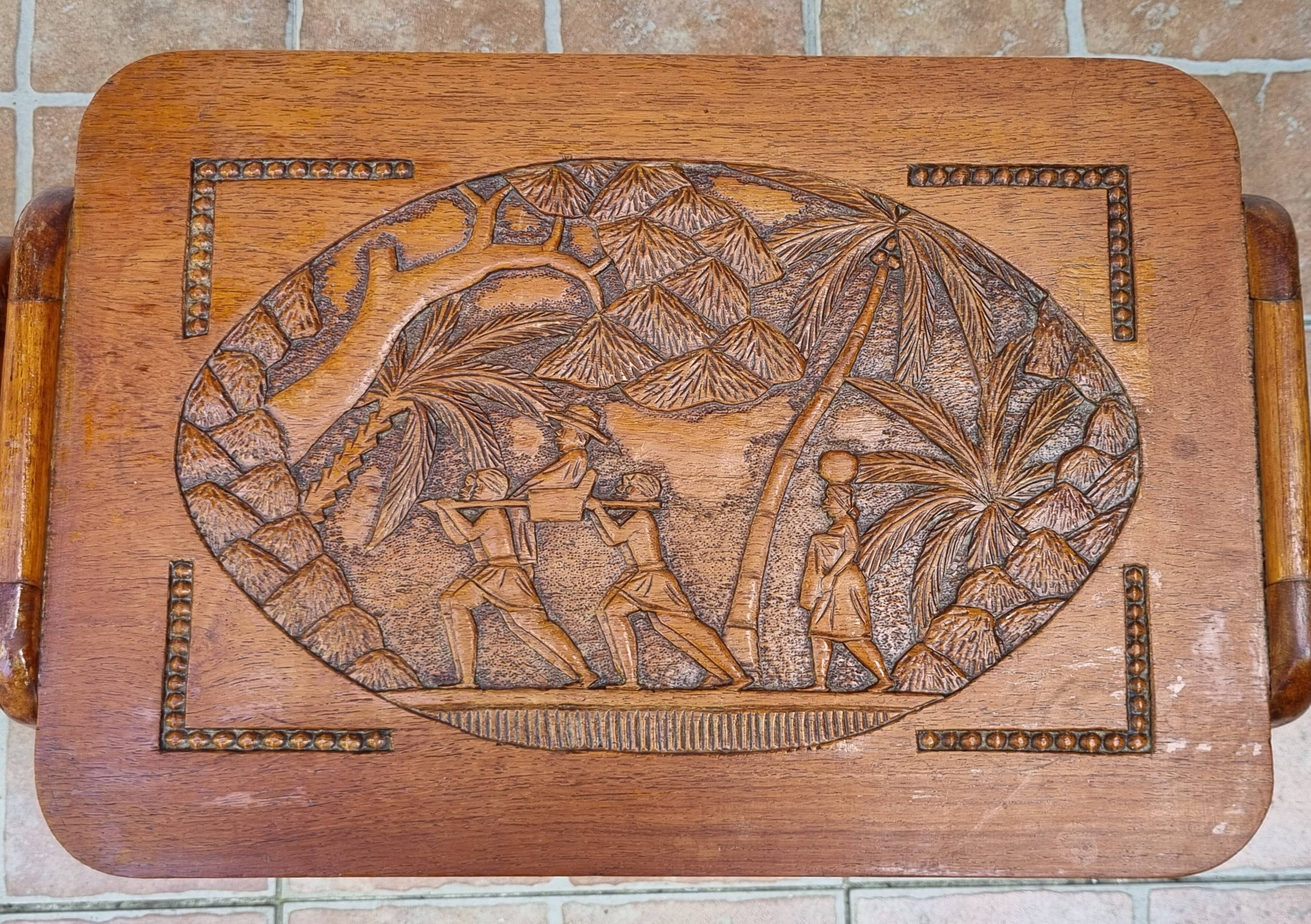 Pair of Malagasy nesting tables in carved wood, signed, m.o.f, 1955