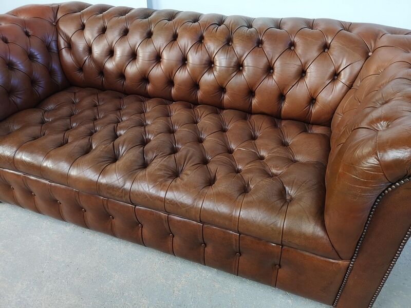 Light brown leather chesterfield sofa