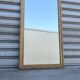Mirror in wood and stucco in burl wood style, 1960