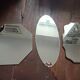 Three beveled mirrors