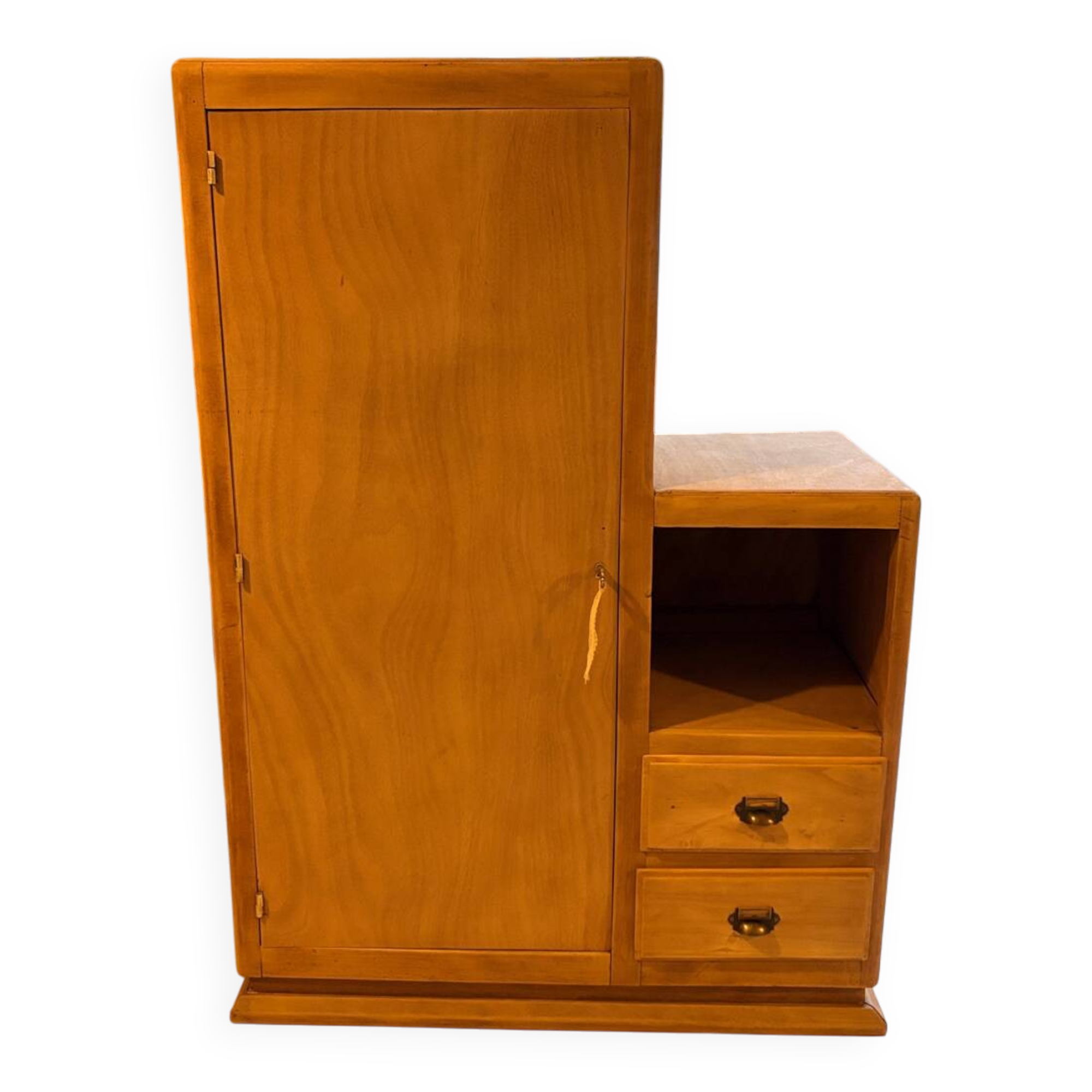 Asymmetrical cabinet made of raw wood