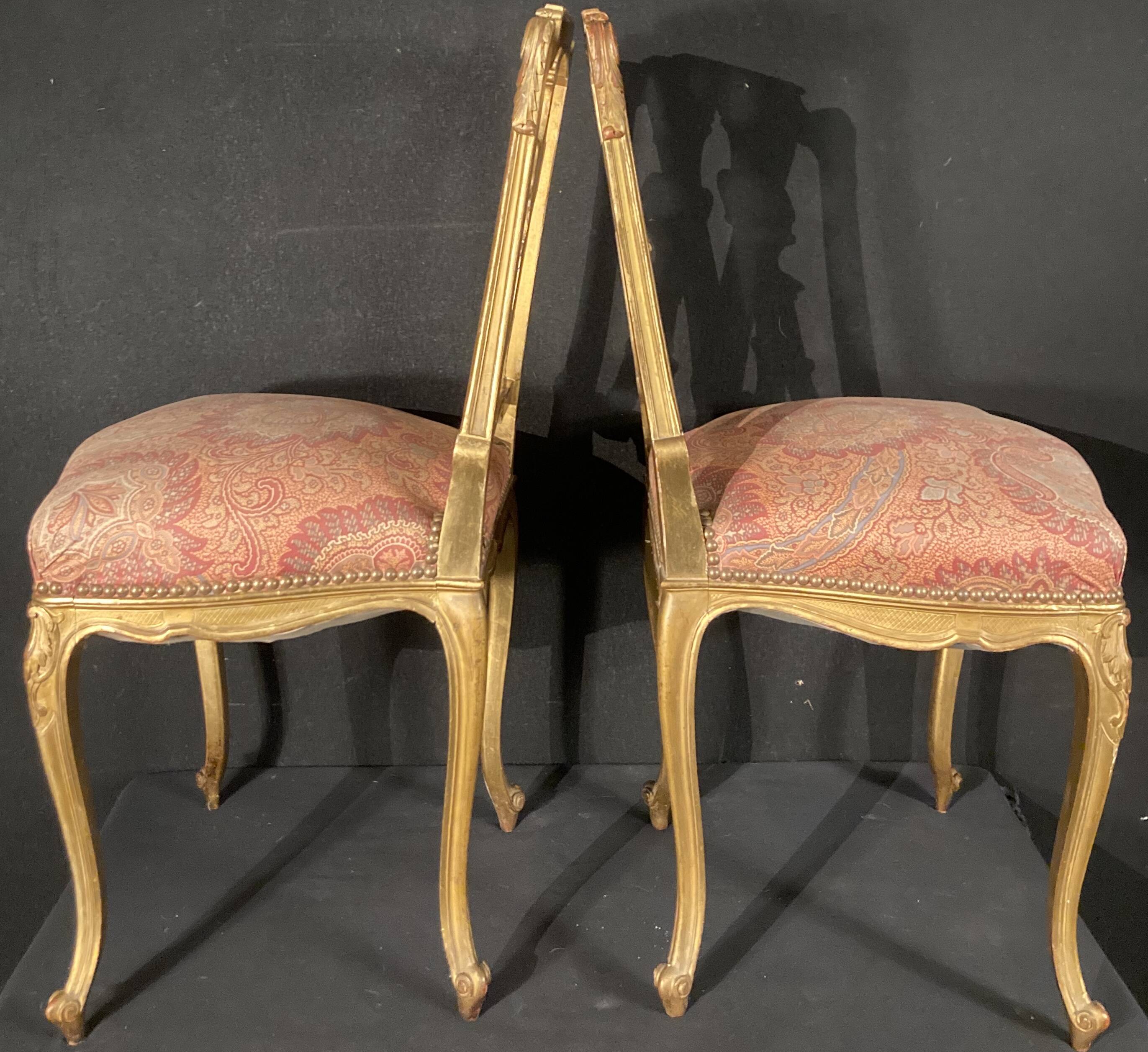 Pair of gilded wooden chairs