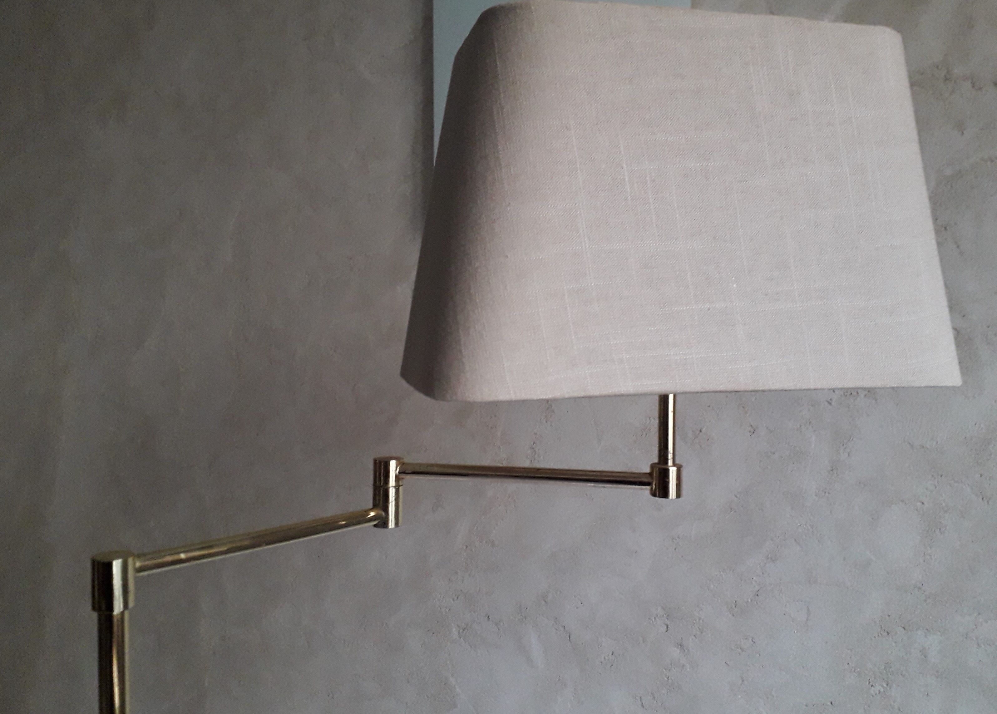 Brass articulated floor lamp