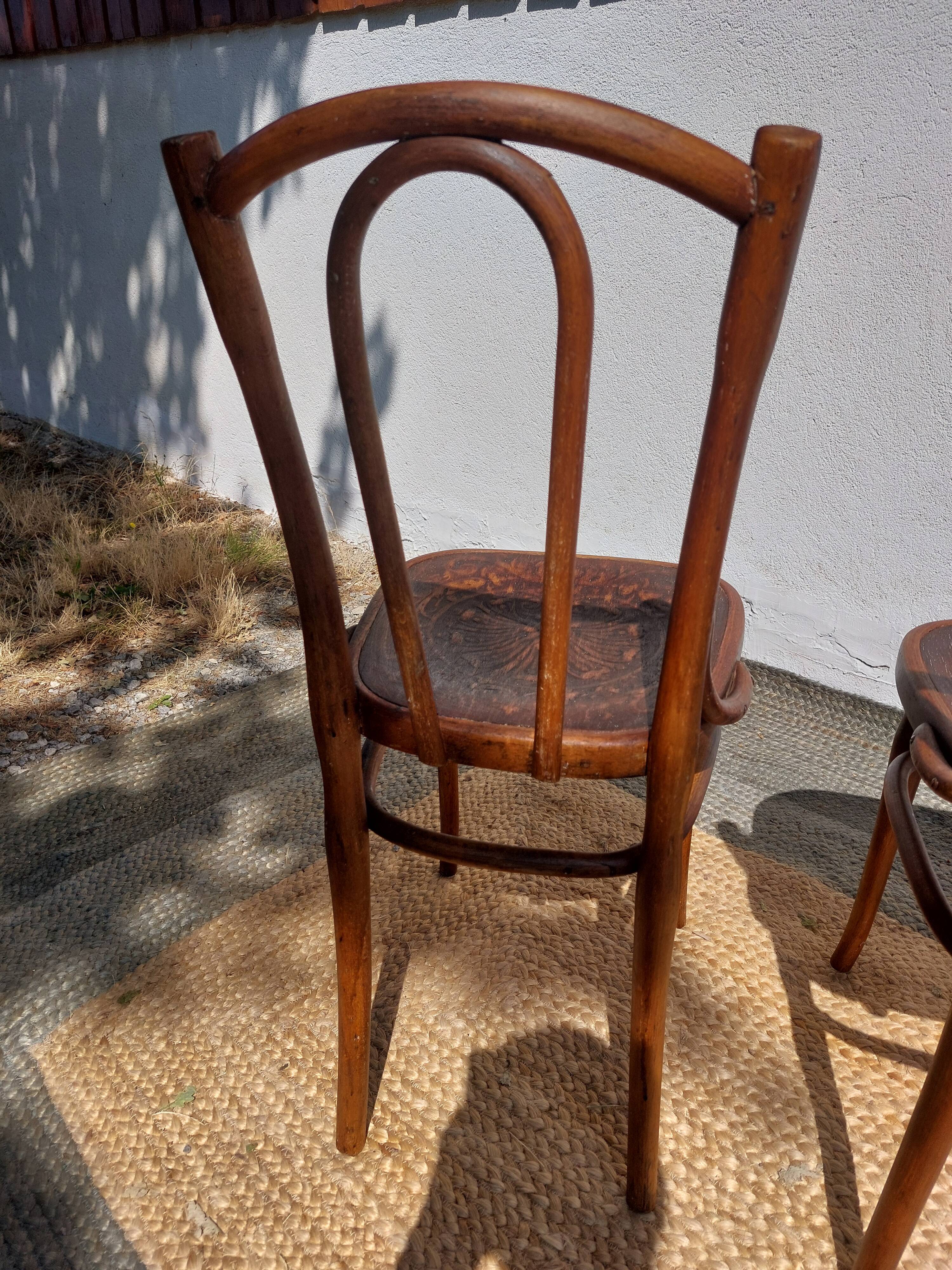 set of 3 curved wooden bistro chairs with patterns