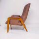 Vintage armchair in light brown faux leather, 1960s.