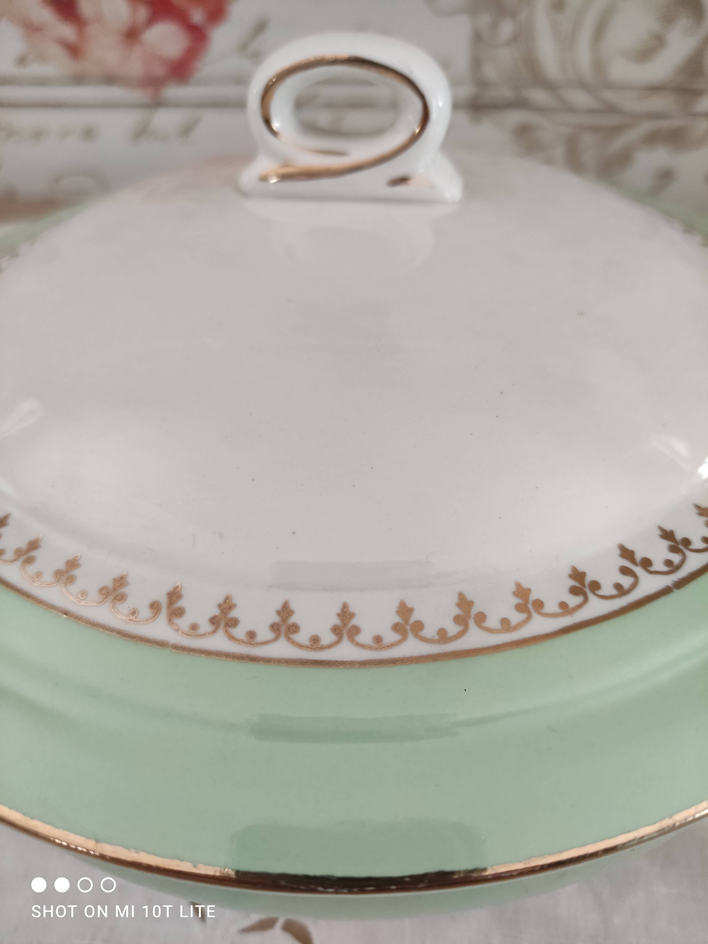 Water green vegetable dish with golden frieze, Cafés Lemaire.