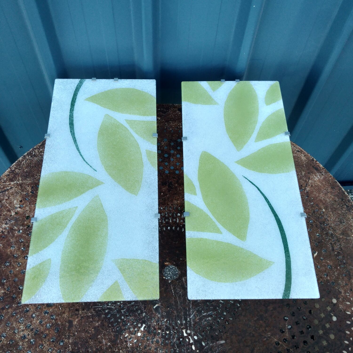 Pair of Gyllen glass wall lamps