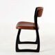 Set of 4 vintage wood and skai sled chairs