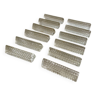 12 glass knife holders.