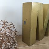 Golden vintage sign letter M