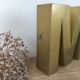 Golden vintage sign letter M